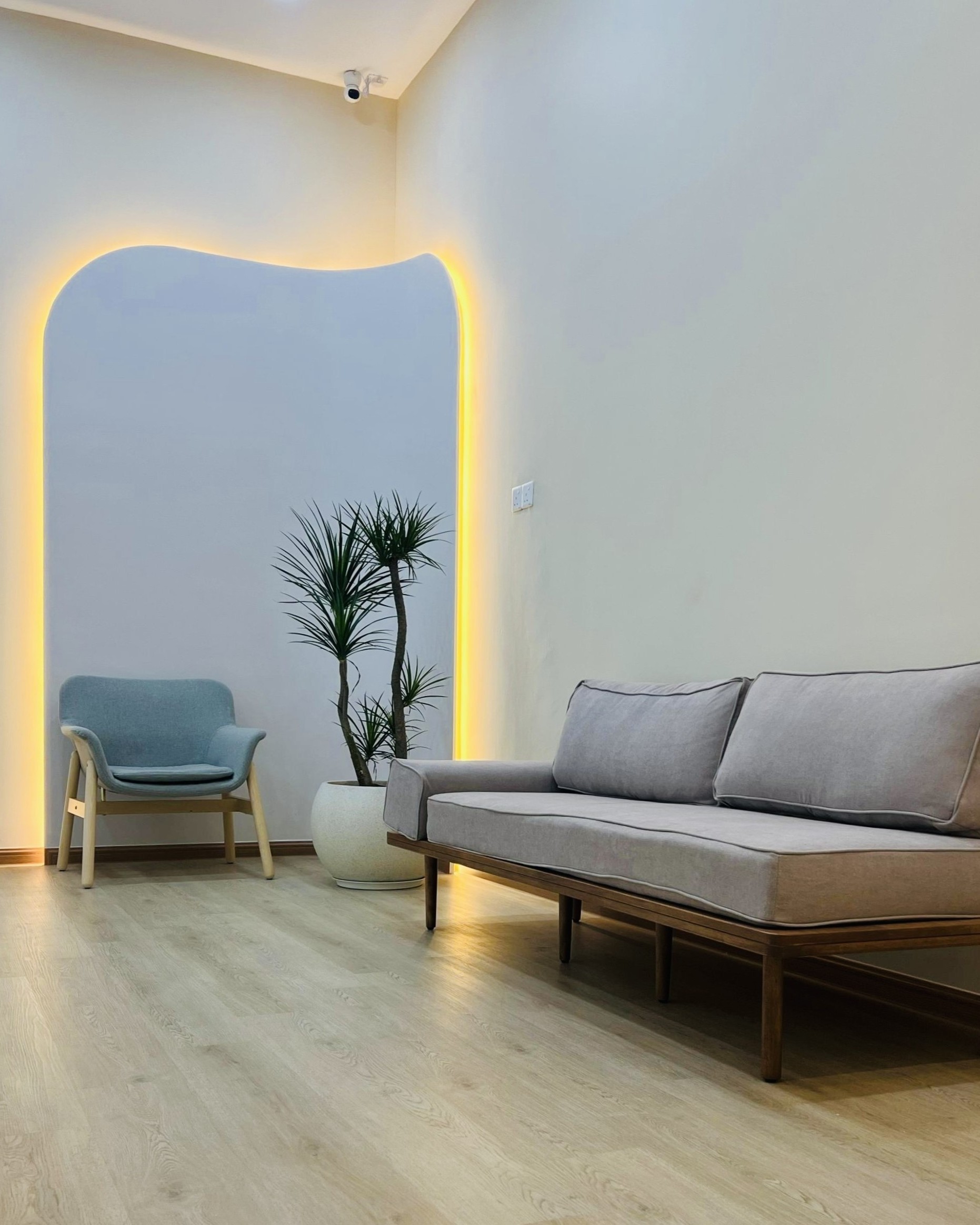 Cosy seating nook in the waiting area at OneHealth Clinic Bukit Indah